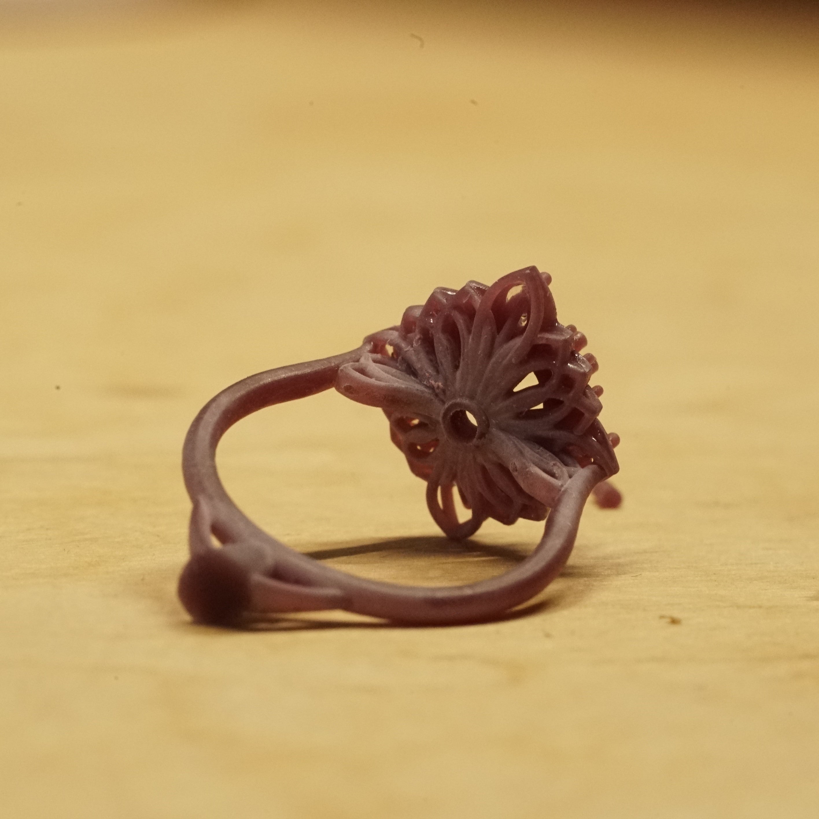 a 3d printed wax model of a custom ring design