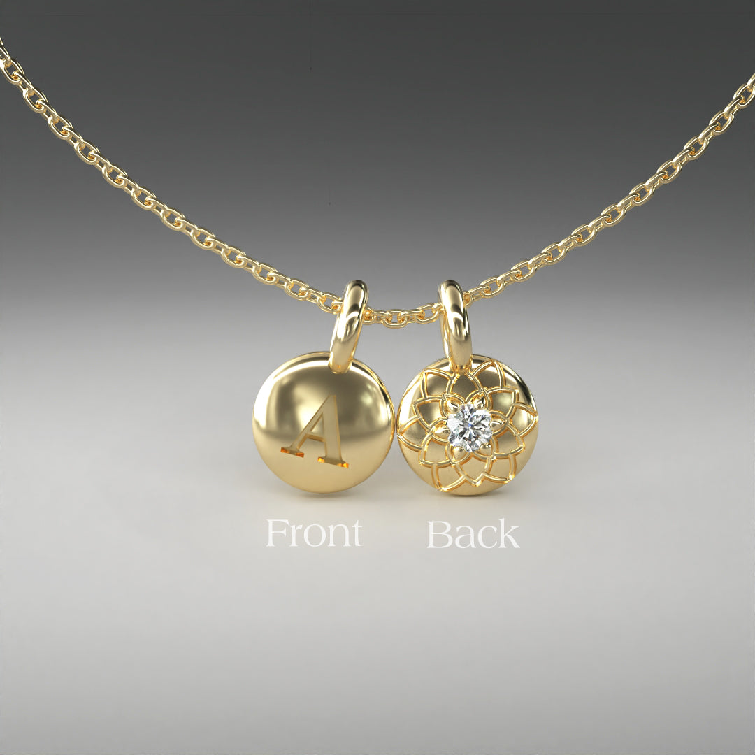 A computer rendering of a pair of yellow gold and diamond pendants on a chain